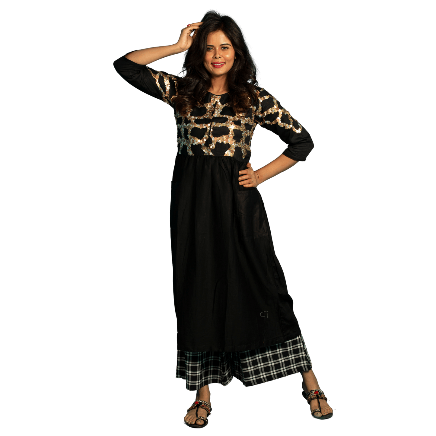 Indulge in the timeless elegance of our Women's Black Kurta Dress with checks Pant. This A-line cut dress is designed for both comfort and style. Available in plus sizes, it offers a flattering fit for every body type. Elevate your wardrobe with this sophisticated and exclusive piece. Made from 100% organic linen and prewashed for ultimate comfort, this dress pairs perfectly with the free size pants adorned with eye-catching 3D embroidery. Get ready to turn heads and stand out from the crowd in this unique