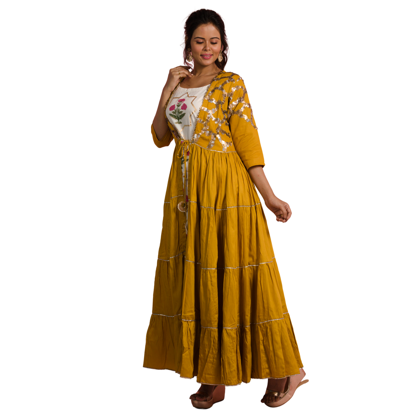 Get ready to turn heads at your next party or wedding with this stunning Mustard Yellow Sequins Dress! Adorned with embroidered sequins, this dress is perfect for any festive occasion. With a playful touch of half functions, it's a wardrobe must-have for every woman. Be it at a half function or a celebration of Diwali festival, this dress surely catches an eye.