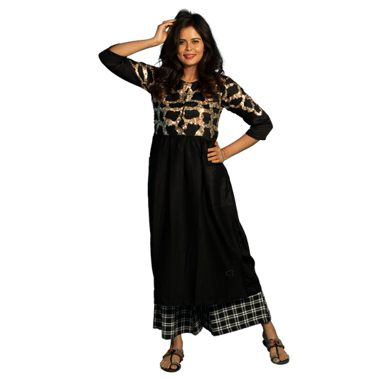 Indulge in the timeless elegance of our Women's Black Kurta Dress with checks Pant. This A-line cut dress is designed for both comfort and style. Available in plus sizes, it offers a flattering fit for every body type. Elevate your wardrobe with this sophisticated and exclusive piece. Made from 100% organic linen and prewashed for ultimate comfort, this dress pairs perfectly with the free size pants adorned with eye-catching 3D embroidery. Get ready to turn heads and stand out from the crowd in this unique 
