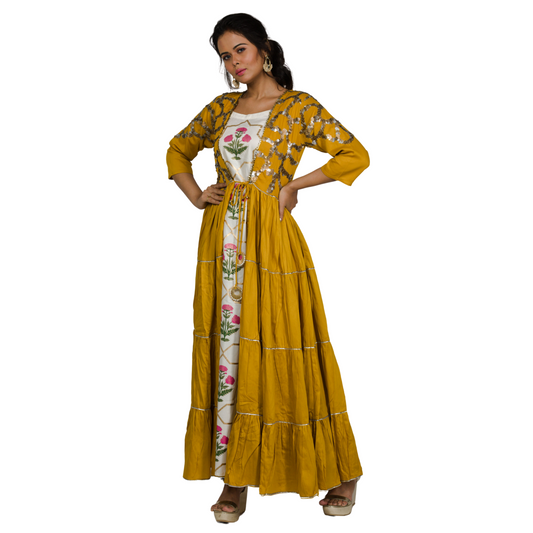 Get ready to turn heads at your next party or wedding with this stunning Mustard Yellow Sequins Dress! Adorned with embroidered sequins, this dress is perfect for any festive occasion. With a playful touch of half functions, it's a wardrobe must-have for every woman. Be it at a half function or a celebration of Diwali festival, this dress surely catches an eye.